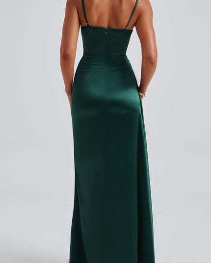 Back view of the deep green satin dress, showing the straight back and full-length skirt.