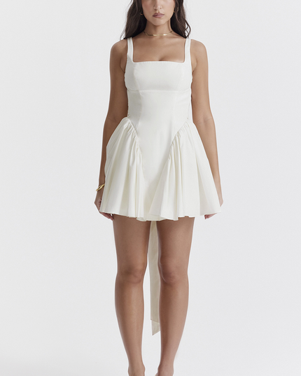 Front view of a white square neck mini dress with a gathered skirt and long back ties, for summer.