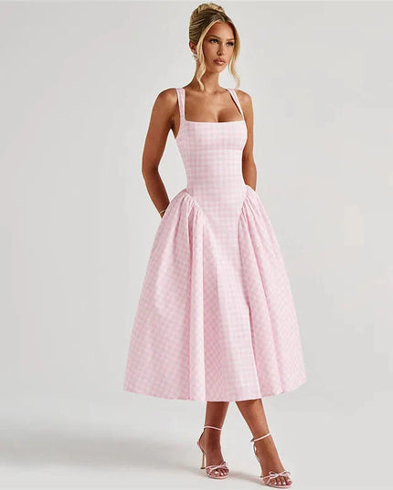 Side profile of women's pink gingham square neck midi dress, showing full skirt and fitted bodice