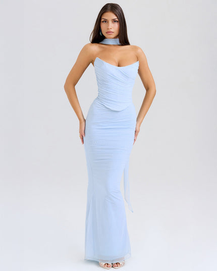 Front view of the light blue strapless ruched maxi dress, highlighting the fitted bodice and flowing skirt.