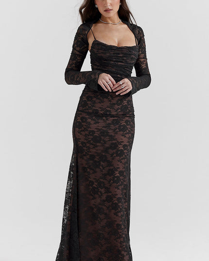 Front view of a black lace maxi dress with long sleeves and a sweetheart neckline, ruched bodice, and subtle floral pattern.