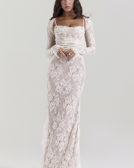 Full-length white lace corset back strapless maxi dress with long sleeve bolero, ruched bodice, and floral lace overlay.