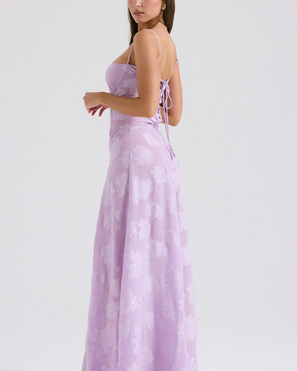 Three-quarter back view of the lavender floral maxi dress, showing the delicate lace-up detail on the back bodice.