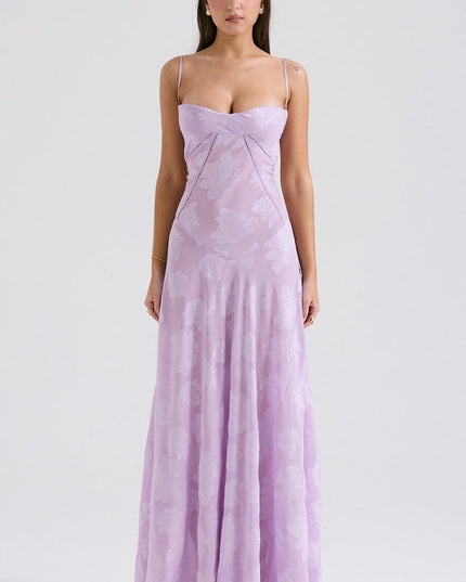 Full-length view of a women's floral printed sweetheart neck maxi dress in light lavender with spaghetti straps, for spring.