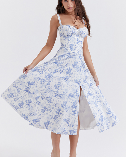 Women's summer floral midi dress with a side slit, showcasing the flow and movement of the skirt