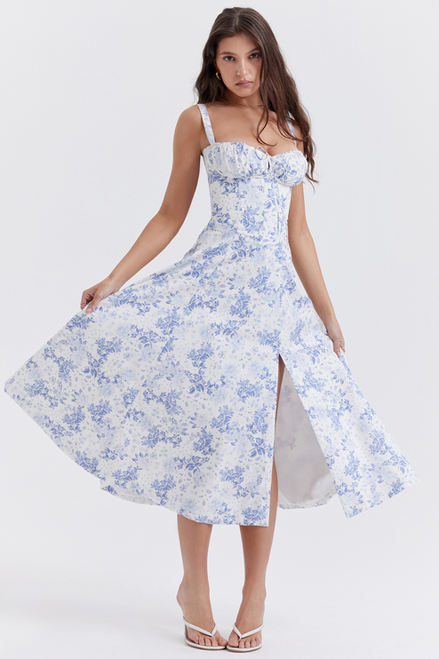 Women's summer floral midi dress with a side slit, showcasing the flow and movement of the skirt