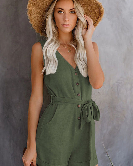 Front view of a women's sleeveless olive green V-neck romper with button details and a tie waist.