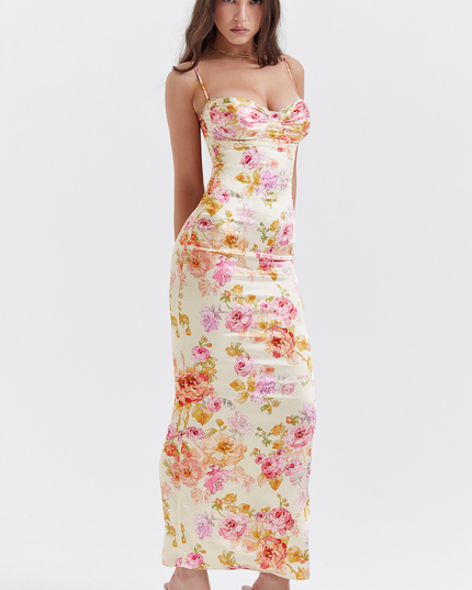 Elegant women's floral maxi dress with sweetheart neckline, subtle lace trim, and spaghetti straps, side view.