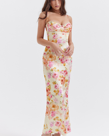 Front view of women's floral sweetheart neck maxi dress in a light yellow with pink and orange floral pattern.