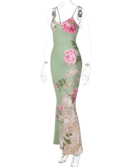 Angled view of a green floral print V-neck maxi dress with pink roses on a mannequin, white background.