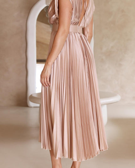 Back view of the champagne pleated v-neck midi dress, showcasing the deep V-back design and delicate tie details.