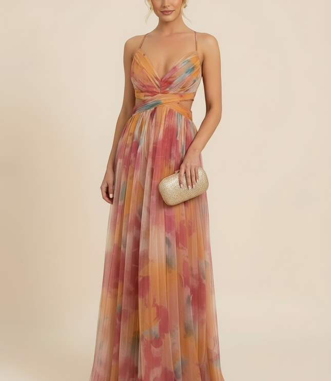 Full-length view of a women's sleeveless maxi dress for wedding guests, featuring a vibrant floral pattern and V-neckline.