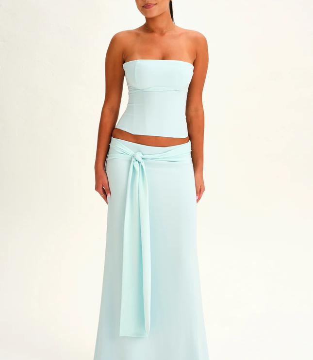 Light blue strapless corset maxi dress with high waist and front tie sash, full length front view